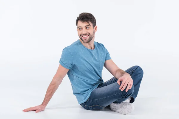 Man sitting on floor Stock Picture