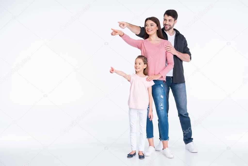 Happy family pointing