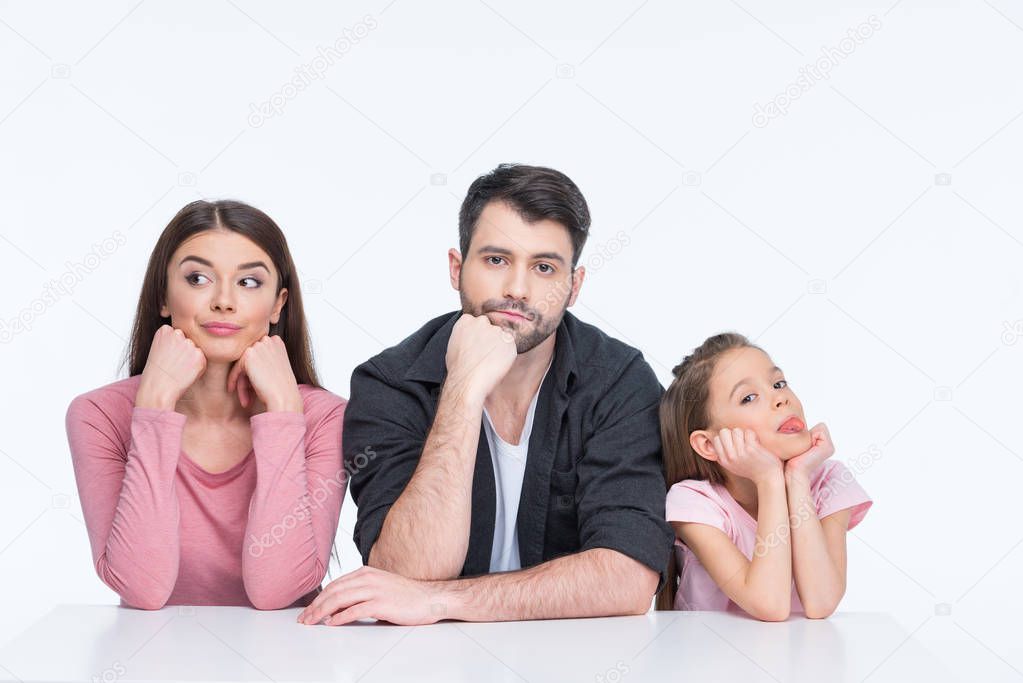 Pensive young family  