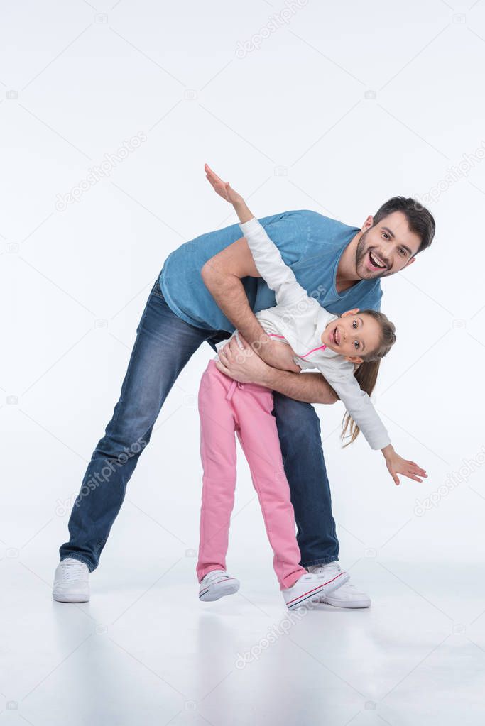 playing father and daughter