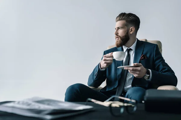 Businessman with cup of coffee — Stock Photo, Image