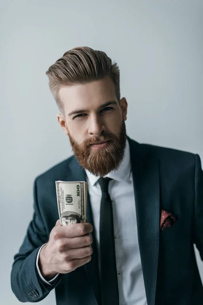 Affärsman med dollar sedlar — Stockfoto