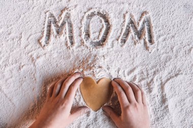 Word mom in flour  clipart