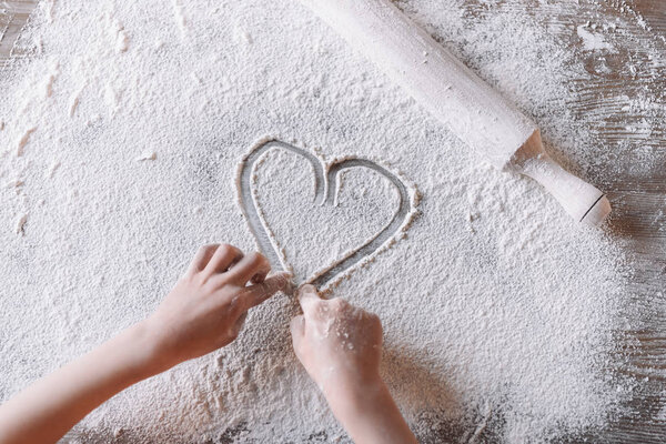 Heart symbol in flour