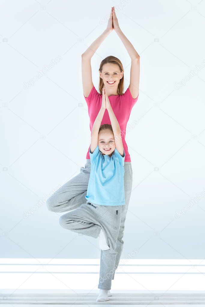 sporty mother and daughter