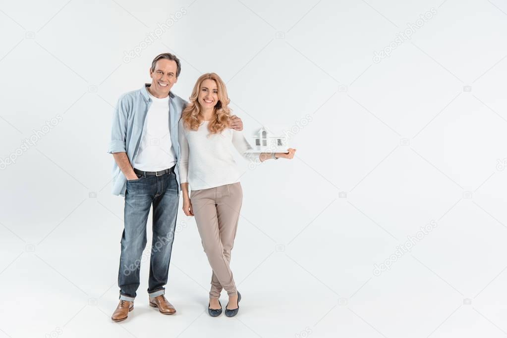 couple with house model