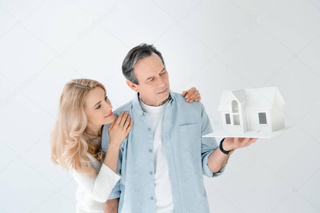 couple with house model