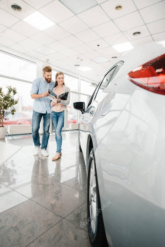 couple in dealership salon  