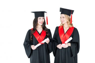 Happy students with diplomas  clipart