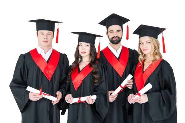 Estudiantes felices con diplomas — Foto de Stock