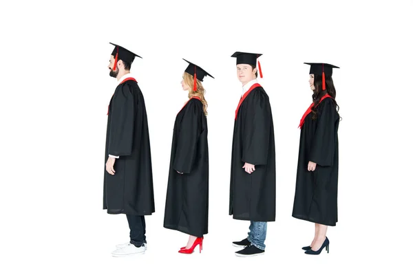 Gelukkig studenten in mortarboards — Stockfoto