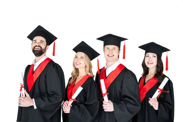 Щасливі студенти з дипломами — стокове фото