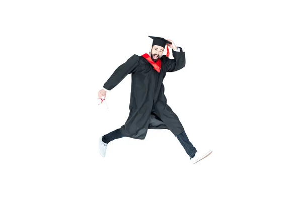 Estudiante en gorra de graduación con diploma — Foto de Stock