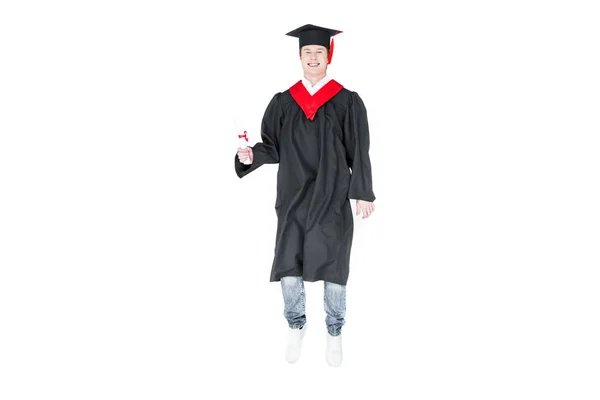 Estudante em boné de graduação com diploma — Fotografia de Stock