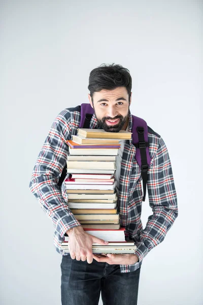 Estudiante con pila de libros —  Fotos de Stock