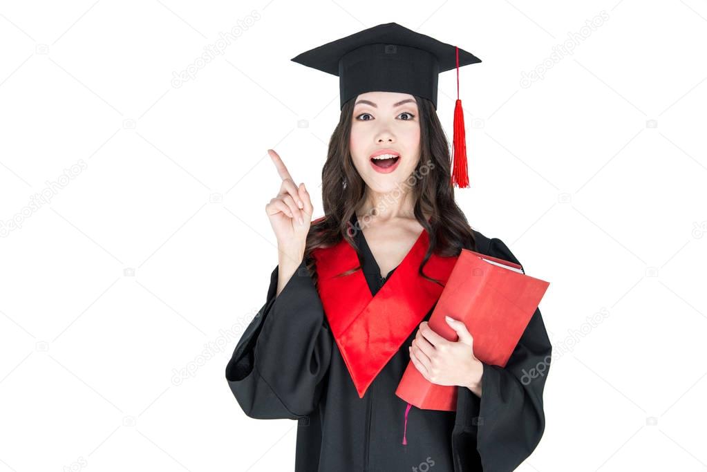 Student holding book 