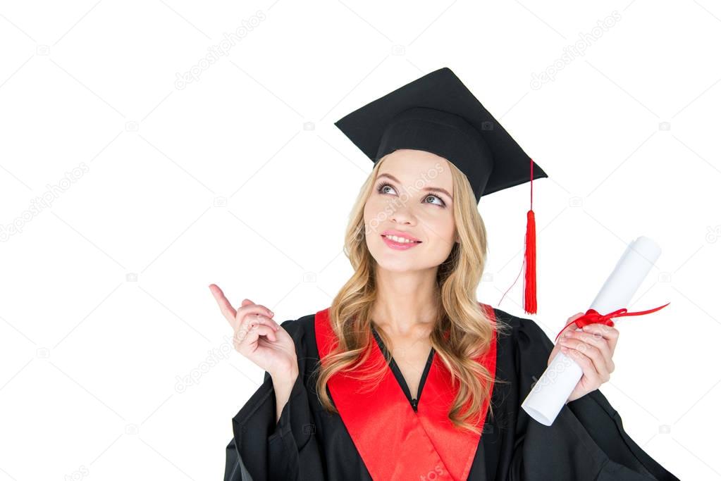 Student holding diploma 