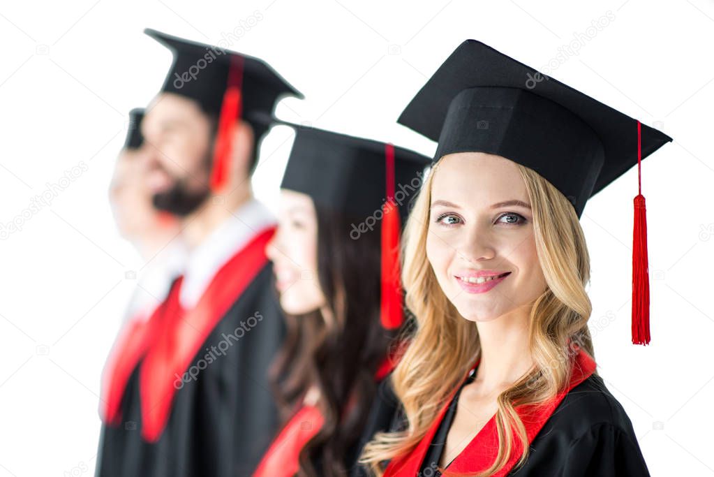 student in graduation cap with diploma