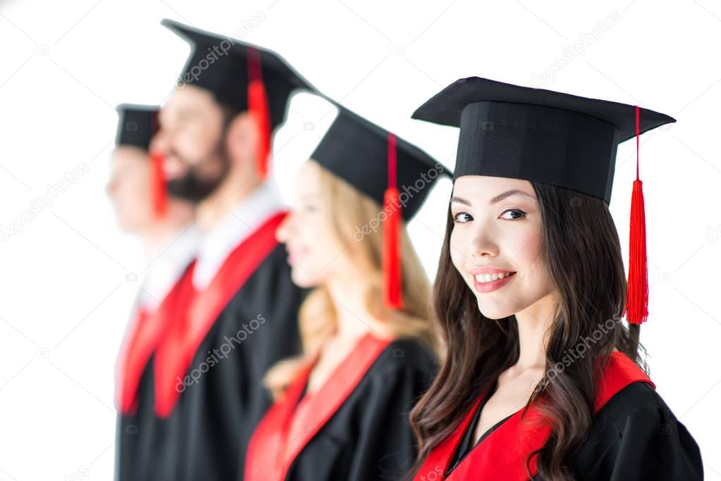 student in graduation cap with diploma