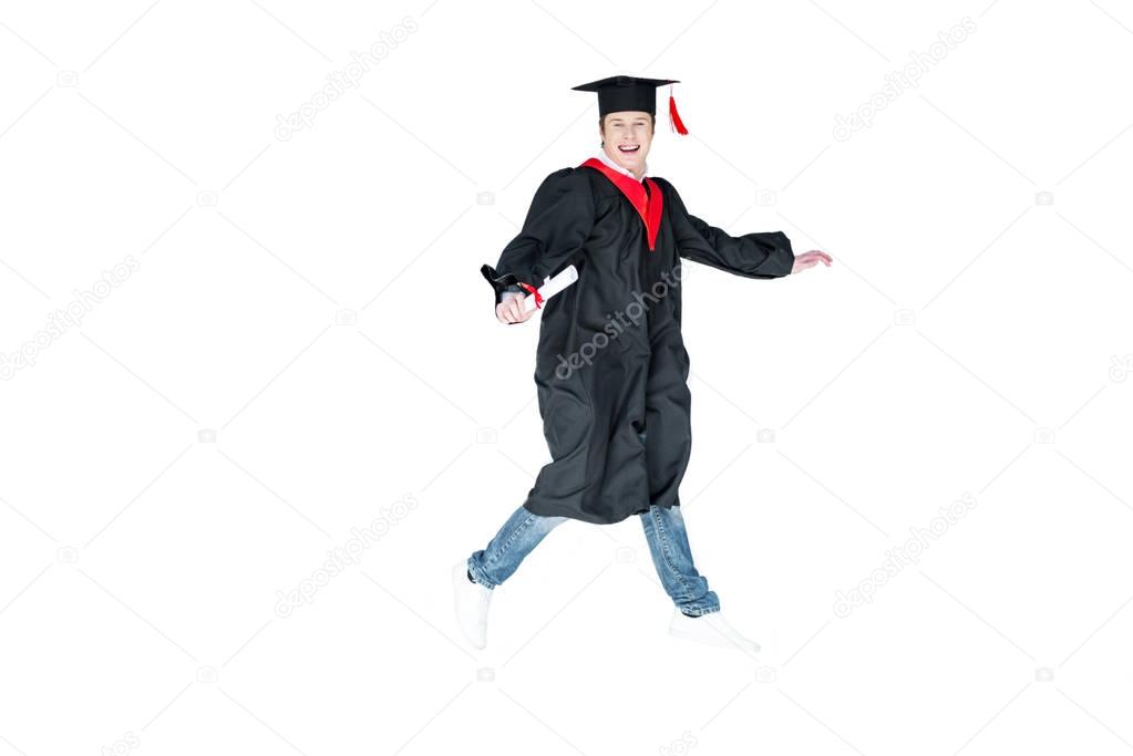 student in graduation cap with diploma