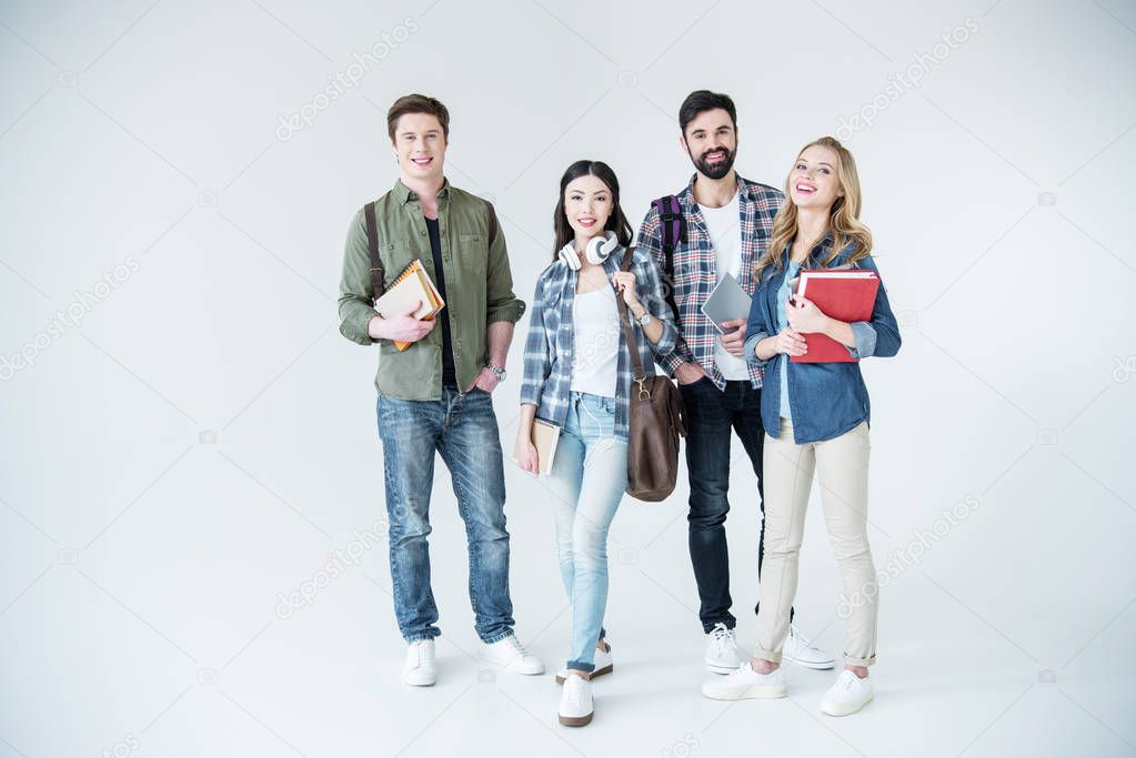 four students with books