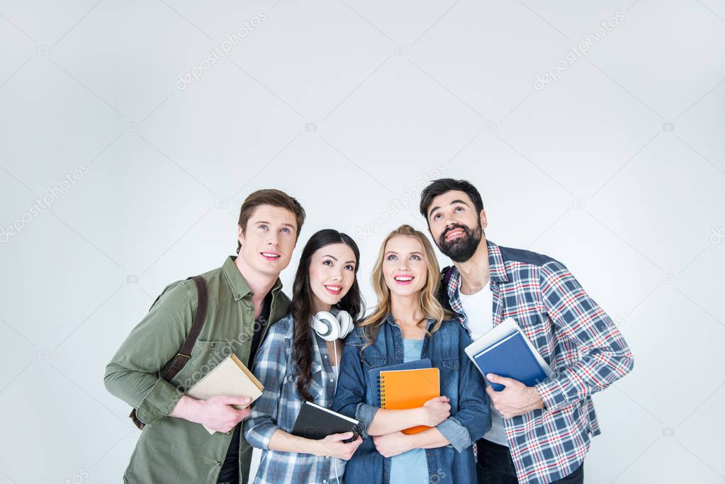 four students with books