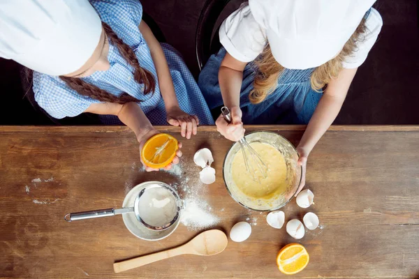 Girls making dough for cookies — Stock Photo, Image