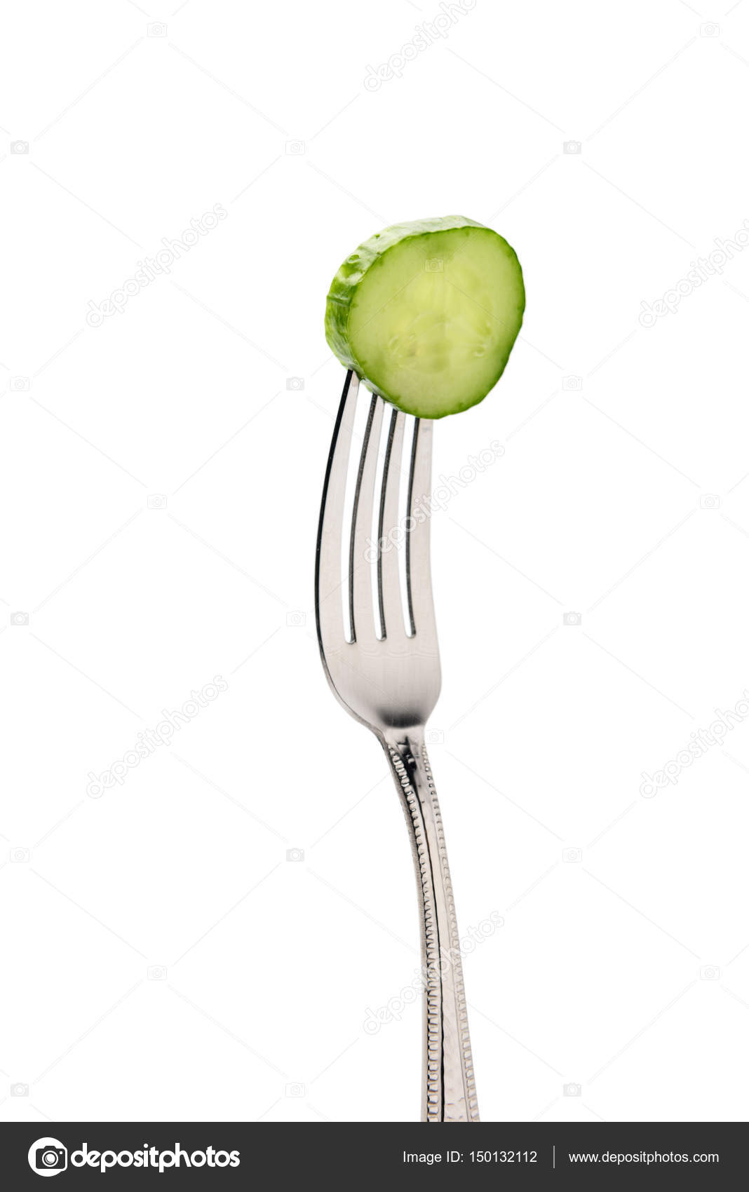 Fresh cucumber slice on fork — Stock Photo © IgorTishenko 150132112