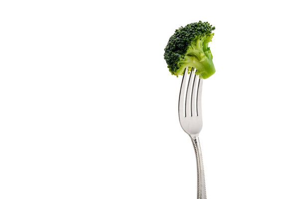 fresh broccoli on fork