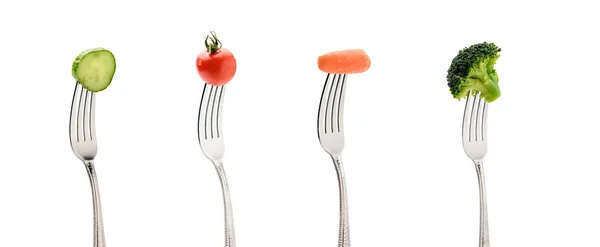 fresh vegetables on forks