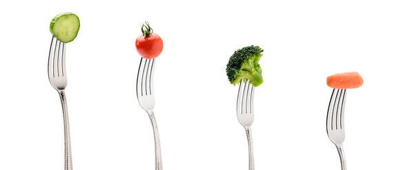 fresh vegetables on forks