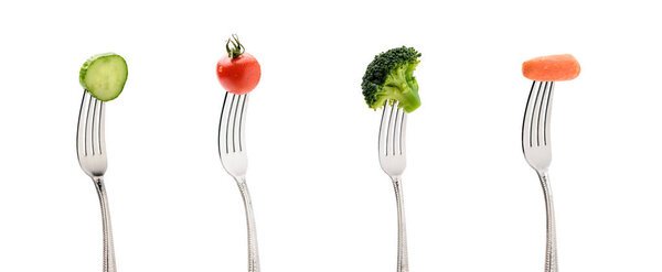 fresh vegetables on forks