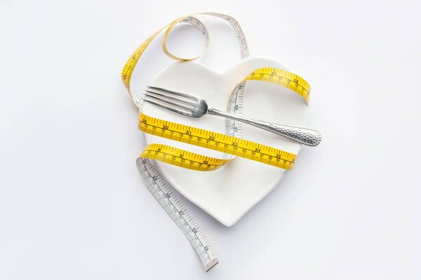 measuring tape and fork