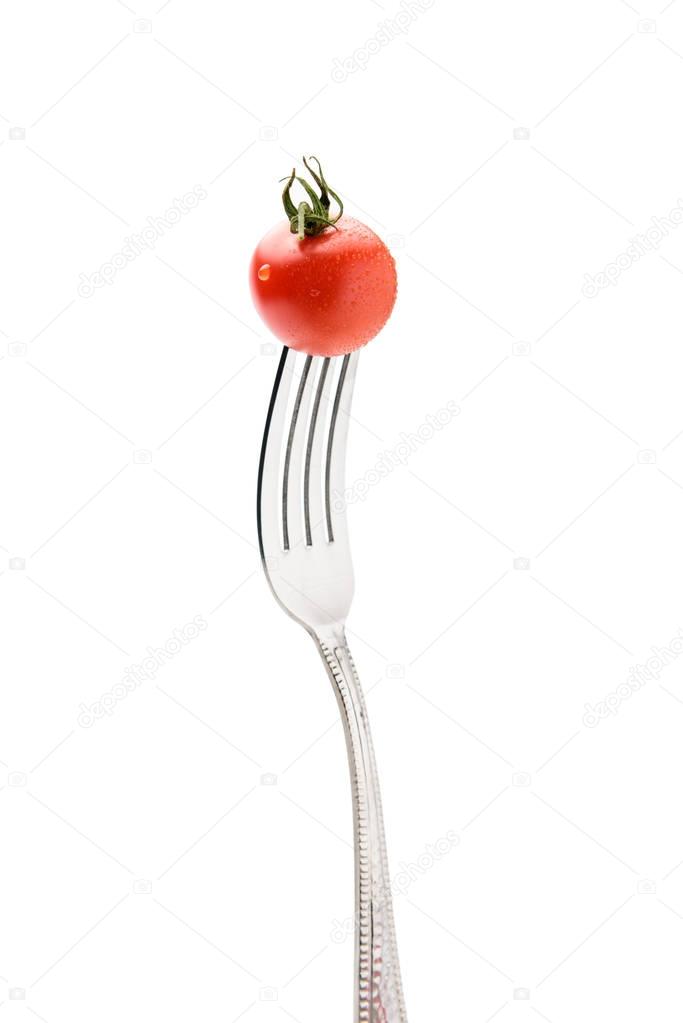 cherry tomatoe on fork