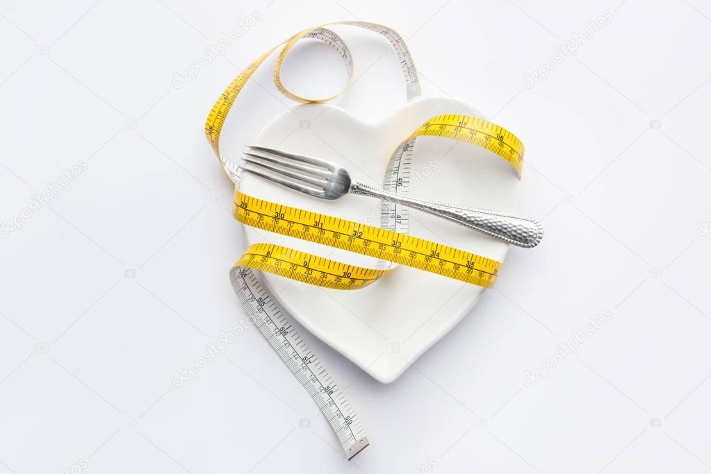 measuring tape and fork