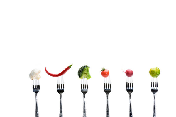 Свежие овощи на вилах
