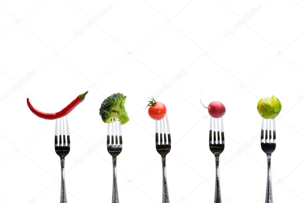 fresh vegetables on forks