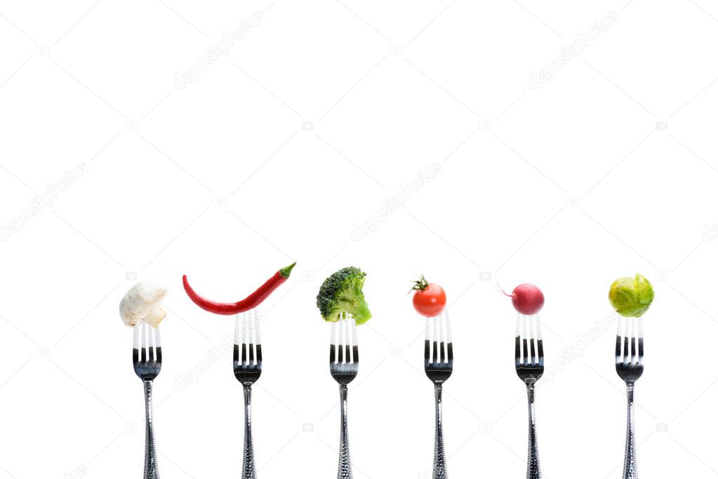 fresh vegetables on forks