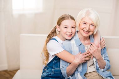Happy grandmother and granddaughter clipart