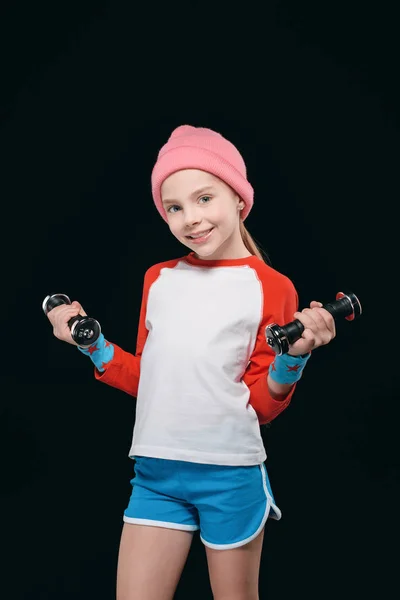 Girl training with dumbbells — Stock Photo, Image