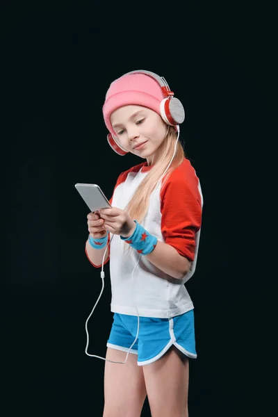 Sportos lány fejhallgató — ingyenes stock fotók
