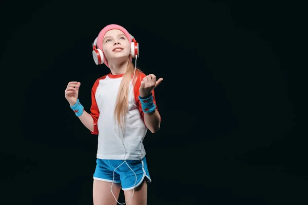 Gadis sporty di headphone — Foto Stok Gratis