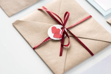 envelope with tag with hearts clipart