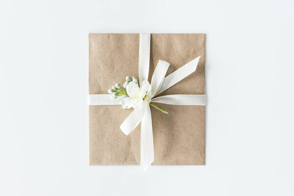 envelope with flower and ribbon