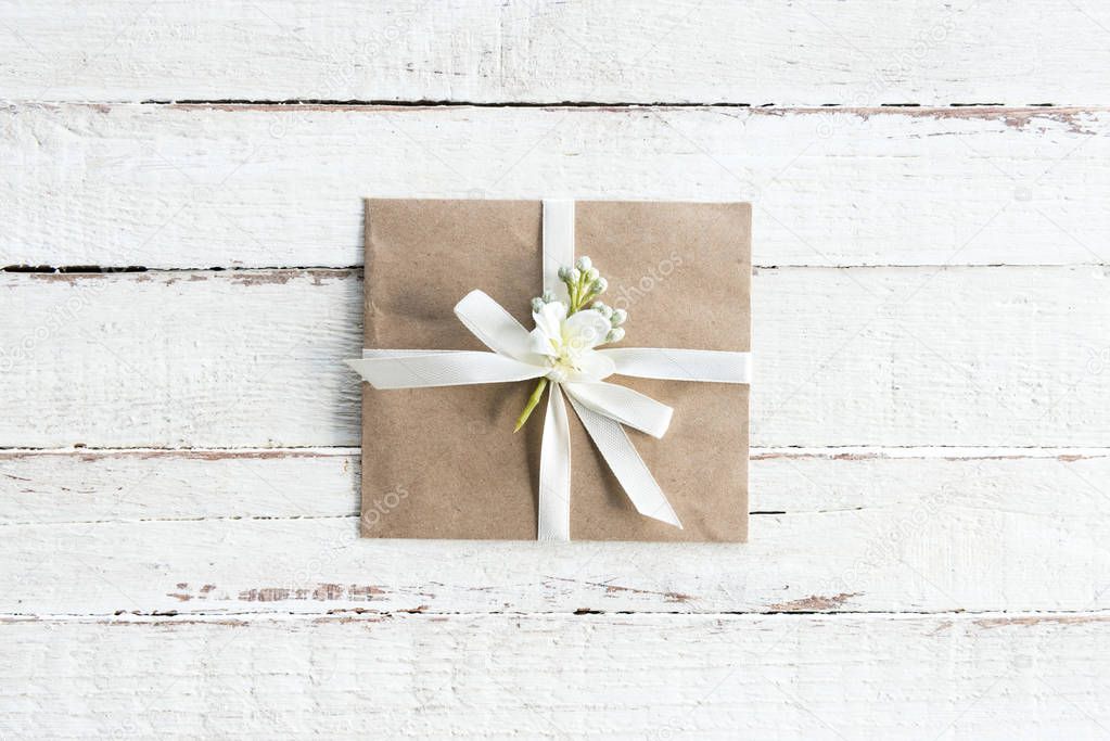 envelope with flower and ribbon 
