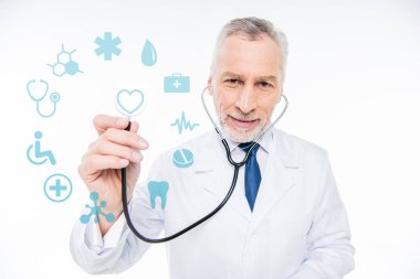 doctor with stethoscope and medical care icons