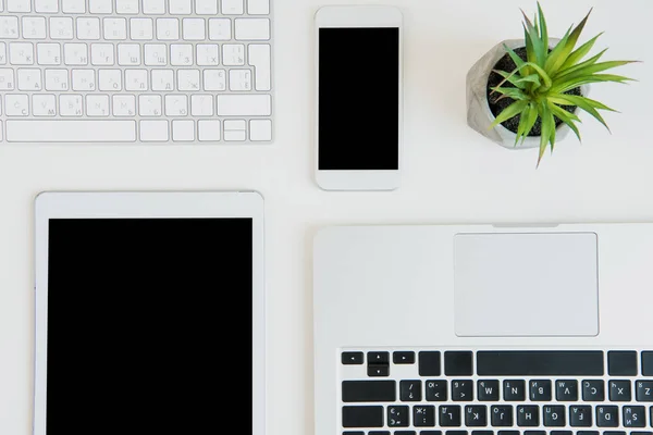 Laptops with digital tablet and smartphone — Stock Photo, Image