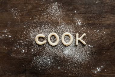 cookies in forms of letters with powdered sugar clipart