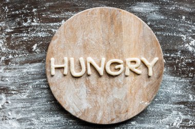 word hungry made from dough clipart