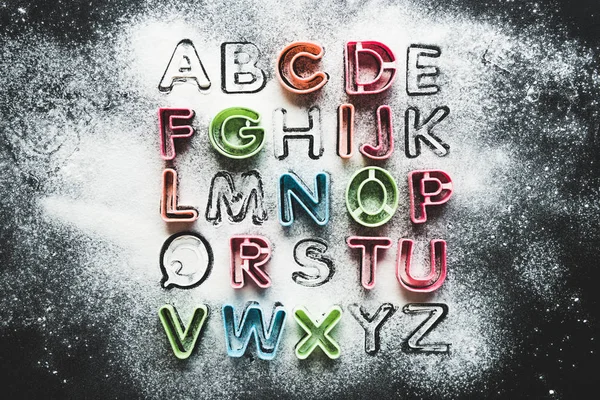 Baking forms for cookies in forms of letters — Stock Photo, Image